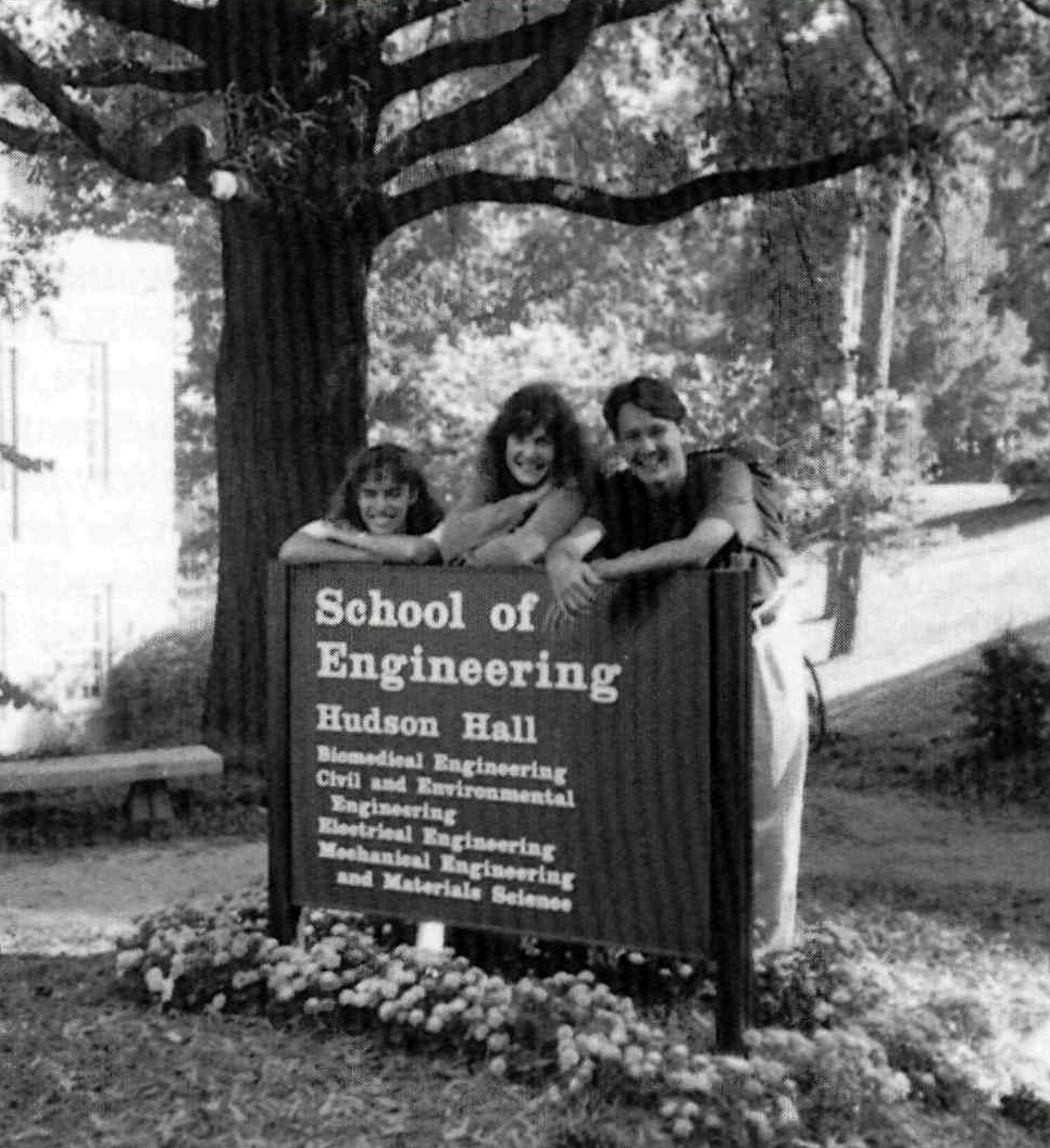 Students at Hudson Hall sign, 1993