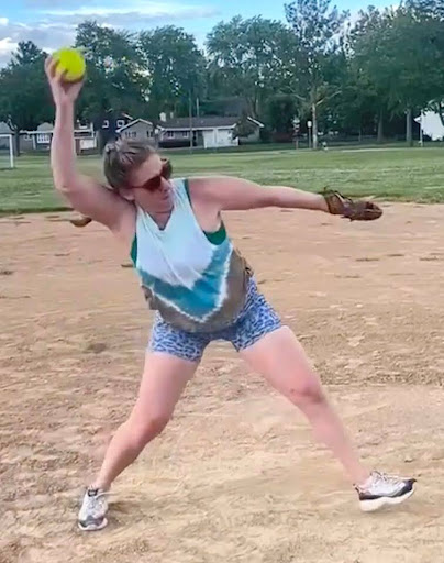 Wendy playing softball