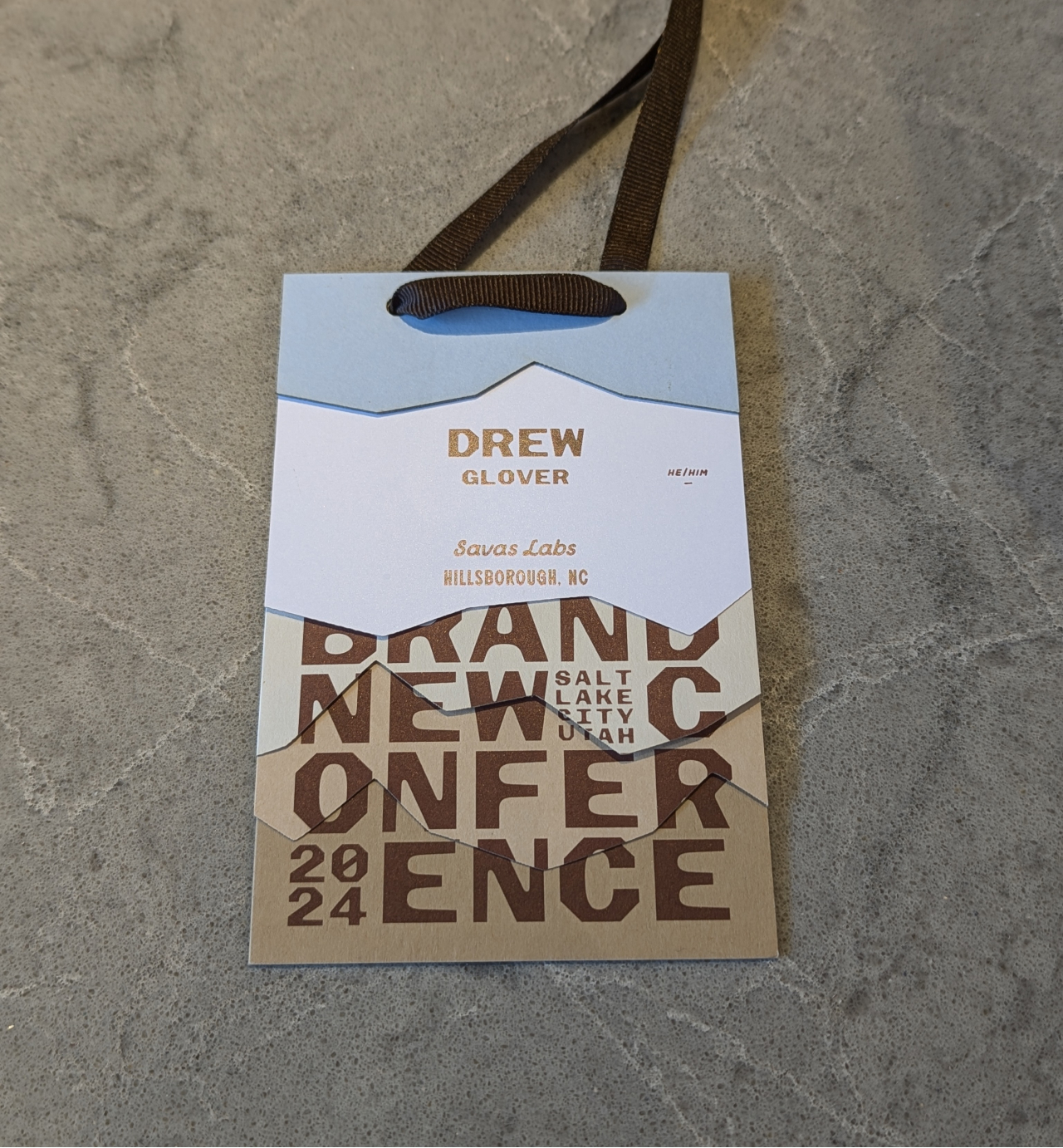 Drew's 2024 Brand New Conference badge.