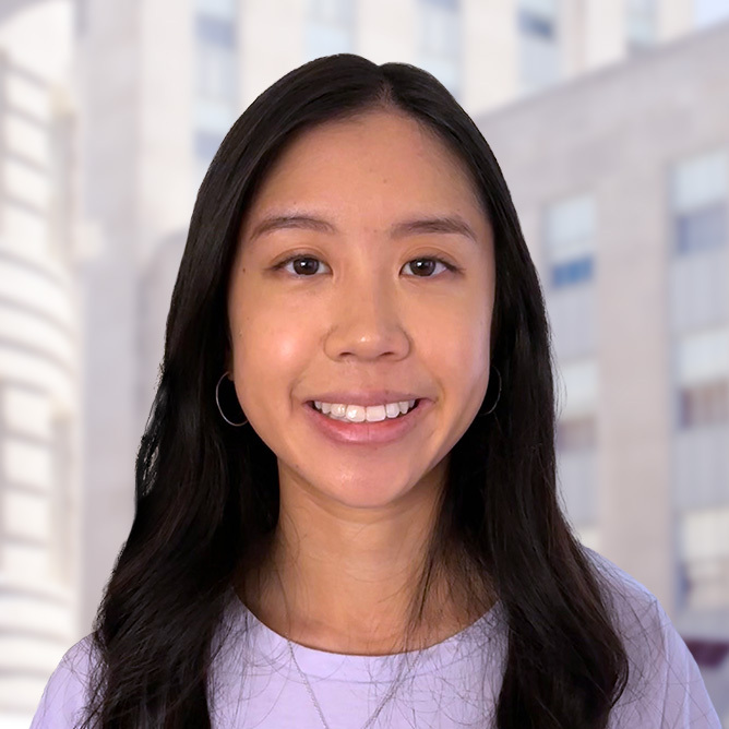 Alison's headshot in front of building