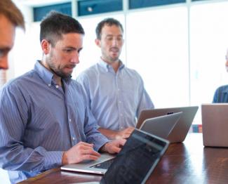 Dan working with the Savas Team