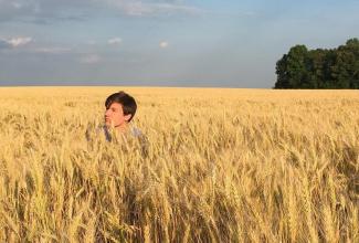 Sean out standing in a field