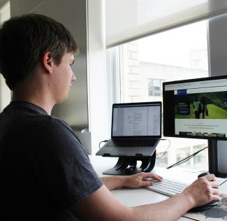 Sean at work in the office