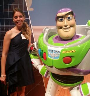 Chelsea Murphy and Buzz Lightyear at the Pixar exhibit