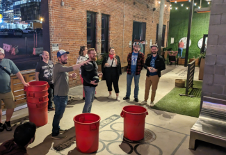 The team playing giant beer pong